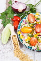 Salad with bulgur groats and vegetables as best food for dieting and slimming