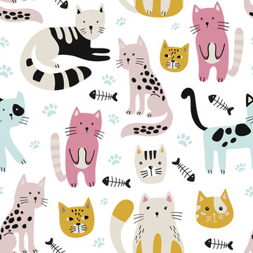 Seamless childish pattern with cute cats .