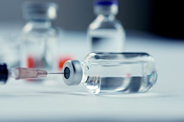 Medicine in vials and syringe , ready for vaccine injection , Cancer Treatment , Pain Treatment and...