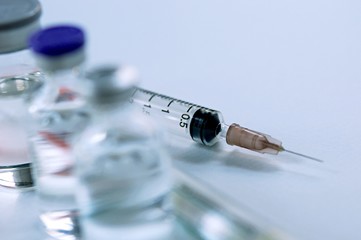 Medicine in vials and syringe , ready for vaccine injection , Cancer Treatment , Pain Treatment and...