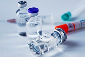 Medicine in vials and syringe , ready for vaccine injection , Cancer Treatment , Pain Treatment and...