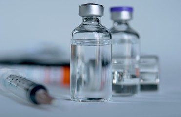Medicine in vials and syringe , ready for vaccine injection , Cancer Treatment , Pain Treatment and can also be abused for an illegal use, healthcare and medical concept vaccination.