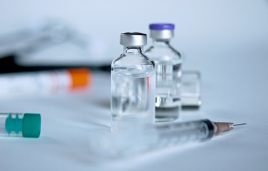 Medicine in vials and syringe , ready for vaccine injection , Cancer Treatment , Pain Treatment and can also be abused for an illegal use, healthcare and medical concept vaccination.