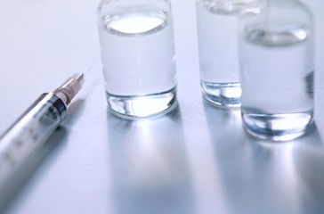 Medicine in vials and syringe , ready for vaccine injection , Cancer Treatment , Pain Treatment and can also be abused for an illegal use, healthcare and medical concept vaccination.