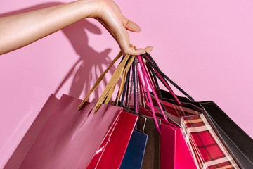 Shopaholic woman with shopping bags