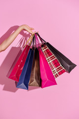 Shopaholic woman with shopping bags