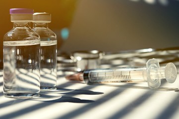 Medicine in vials and syringe , ready for vaccine injection , Cancer Treatment , Pain Treatment and...