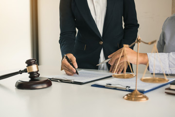 Clients come to seek advice for the law regarding privacy violations with the lawyer at the office.