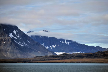 Obraz premium The picturesque landscape of the arctic island. Svalbard. Norway.