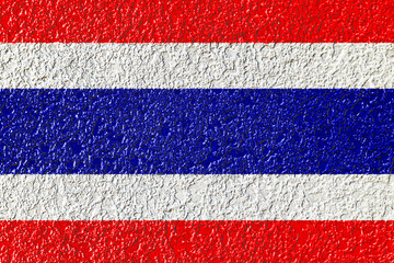 Abstract image of Thailand flag on rough colorful cement plaster wall texture background.