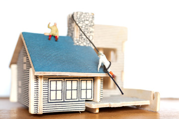 Miniature people stay at home doing self-quarantine , stay home concept