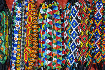 Tribal colorful beads bracelets for sale for tourists at the street market in Kota Kinabalu, island Borneo, Malaysia