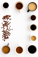 Many cups of coffee on white desk top view space for text