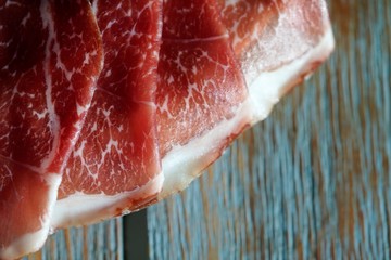 slice of fresh meat on wooden surface