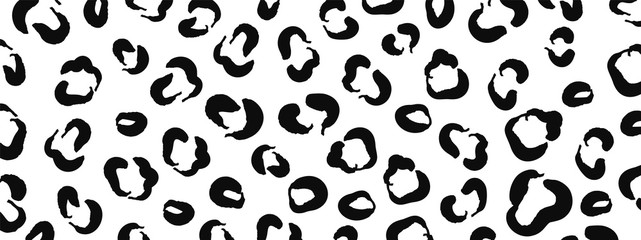 Leopard pattern design vector. Stylised Monochrome black and white Spotted Leopard Skin Background for Fabric, Print, Fashion, Wallpaper. Vector illustration.