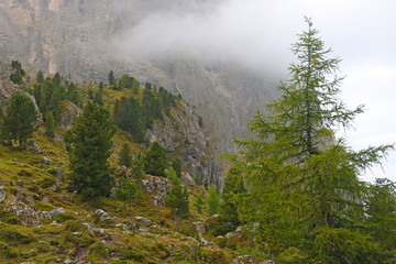 Foggy mountain landscape in Dolomites in Italy.