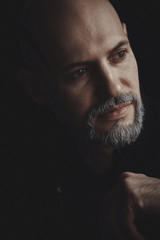 Male prtret bald man with a white beard