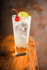 Rum collins cocktail (variation of traditional Tom collins). Selective focus. Shallow depth of field.
