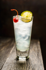 Rum collins cocktail (variation of traditional Tom collins). Selective focus. Shallow depth of field.

