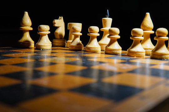 Close-up Of Chess Pieces On Board