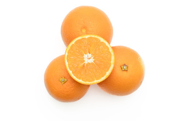 Group of fresh whole and cut orange isolated on white background. From top view