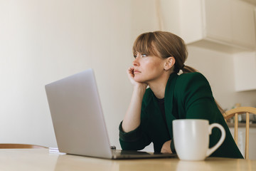 Bored woman working from home during coronavirus quarantine