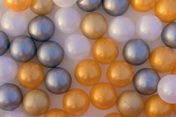 close up of plastic toy colorful ball at the playground for children