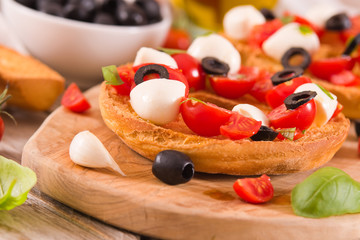 Friselle with tomatoes and mozzarella cheese.
