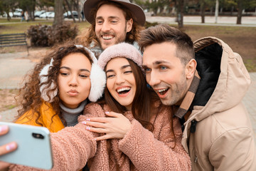 Fototapeta premium Happy friends taking selfie outdoors