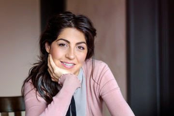 Portrait of a Beautiful Woman with Braces on Teeth. Orthodontic Treatment. Dental Care Concept