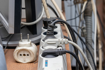 Obraz premium Several electrical outlets connected to electric plugs. 