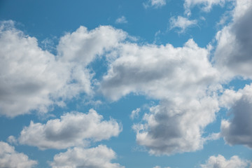 Naklejka na ściany i meble blue sky with cloud and sun closeup