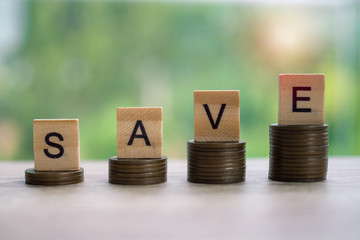Save money. The coins are arranged in order of saving. To show the concept of business growth and wealth