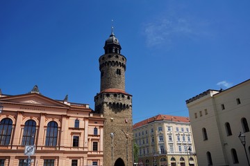 Fototapeta na wymiar Reichenbacher Turm surrounded by different buildings in Goerlitz