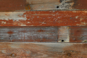 Abstract textured background. Old brown wooden painted surface from cracked boards. The texture of...