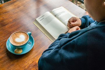 Young student enjoy free day with good book