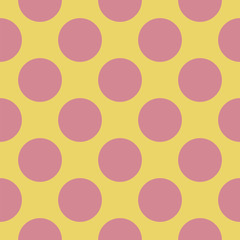 Seamless pattern of large Pink polka dots on a yellow pastel background