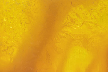 Beautiful abstract texture: multi-colored handmade soap in natural light macro shot. Background for postcards or text design.