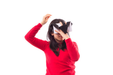 Surprised woman wearing virtual reality googles isolated on white background