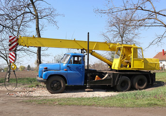 Mobile auto crane standing outdoor