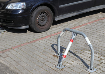 Private parking lot next to a car
