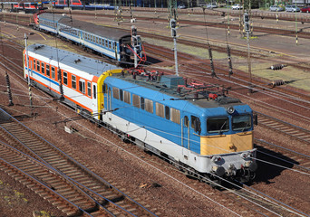 Blue electric train engine view from the bridge