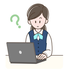 パソコンの前で考える制服の女性