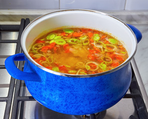 onion soup cooked in a pan in the kitchen