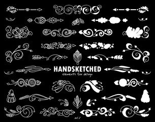 Vector set of calligraphic elements for design drawing in chalkboard style. Hand drawn cute arrows, indexes, dividers, flowers, ear of wheat elements. Ornate and silhouette options
