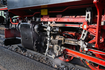 the running gear of an old steam locomotive