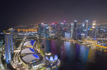 Fototapeta na wymiar Aerial drone view of Singapore business district and city, Business and financial district Modern building in the city center of Singapore on February 2, 2020 in Singapore.