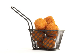 Dutch traditional snack bitterbal in a small basket