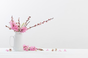 spring  flowers in vase on white background