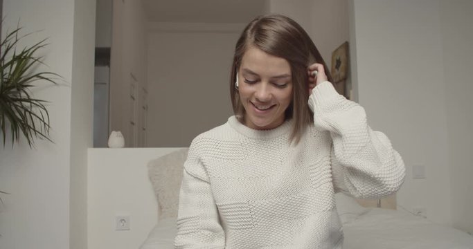 Smiling young woman blogger influencer doing videochat